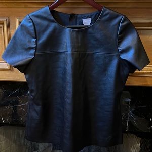 Faux leather tee style top.